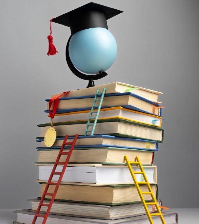 front-view-stacked-books-graduation-cap-ladders-education-day (1)